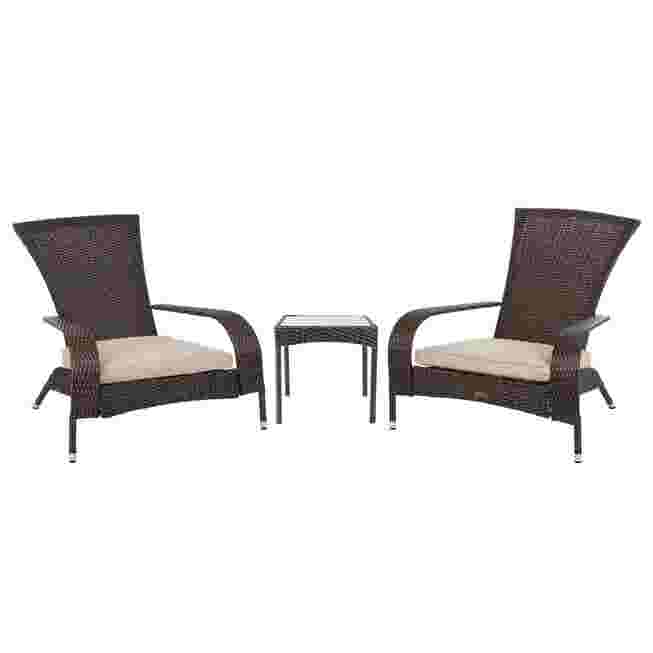 Two dark wicker chairs with light cushions and a small table
